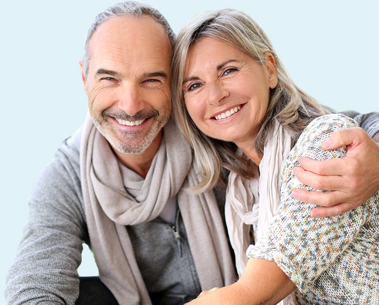 Older man and woman smiling