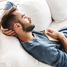 Man sleeping on a couch